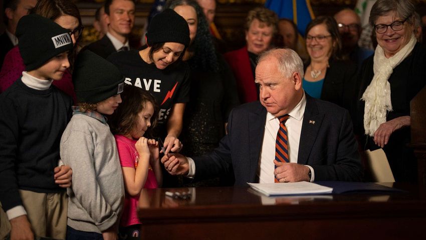  Minnesota Gov. Walz gives tax relief bill 1st signature of legislative session