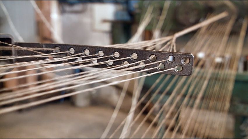  Making a four strand rope of tarred hemp using a historic ropewalk