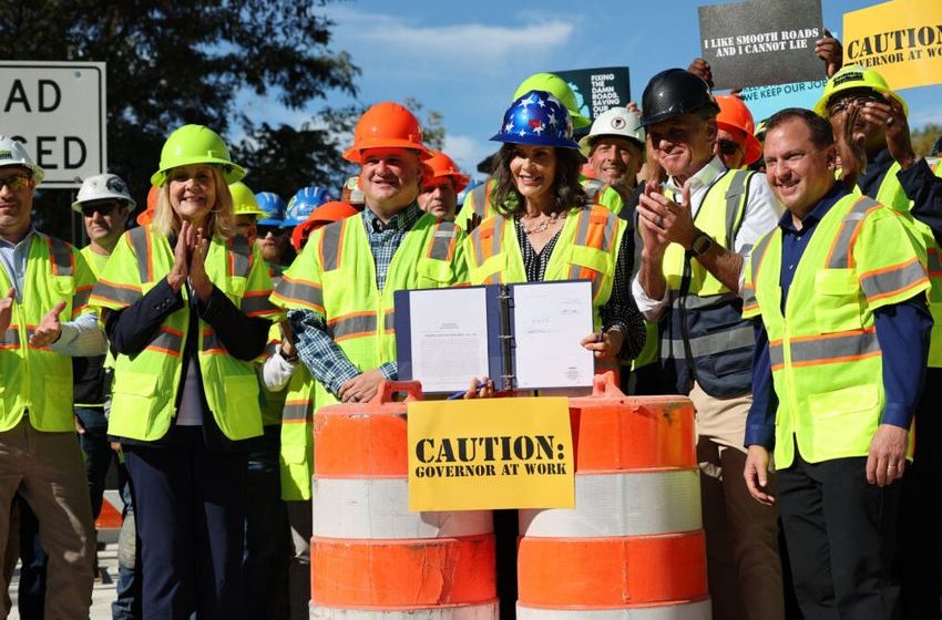 Whitmer signs Michigan road funding package as key pieces of revenue face scrutiny