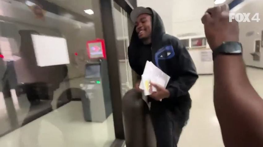  Grinning Kansas City Chiefs star Rashee Rice runs away from cameras as he is released from jail
